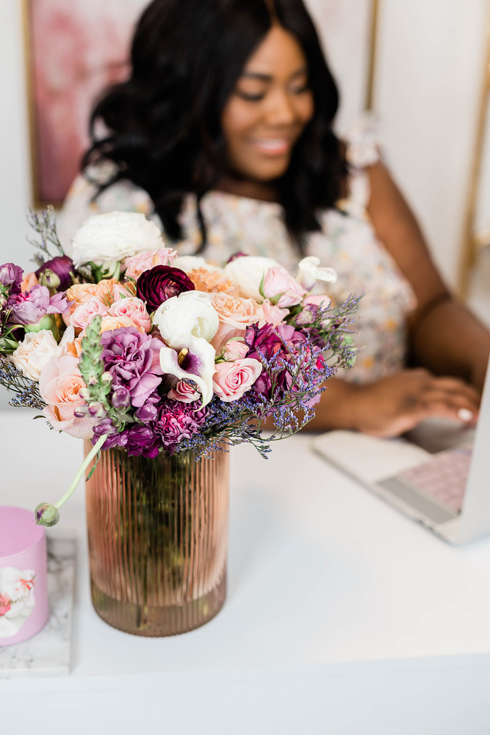 Urban Stems, Floral Arranging, Decorating Office, Flowers in vase, Girl working in office, Home Office Decor, LC Lauren Conrad